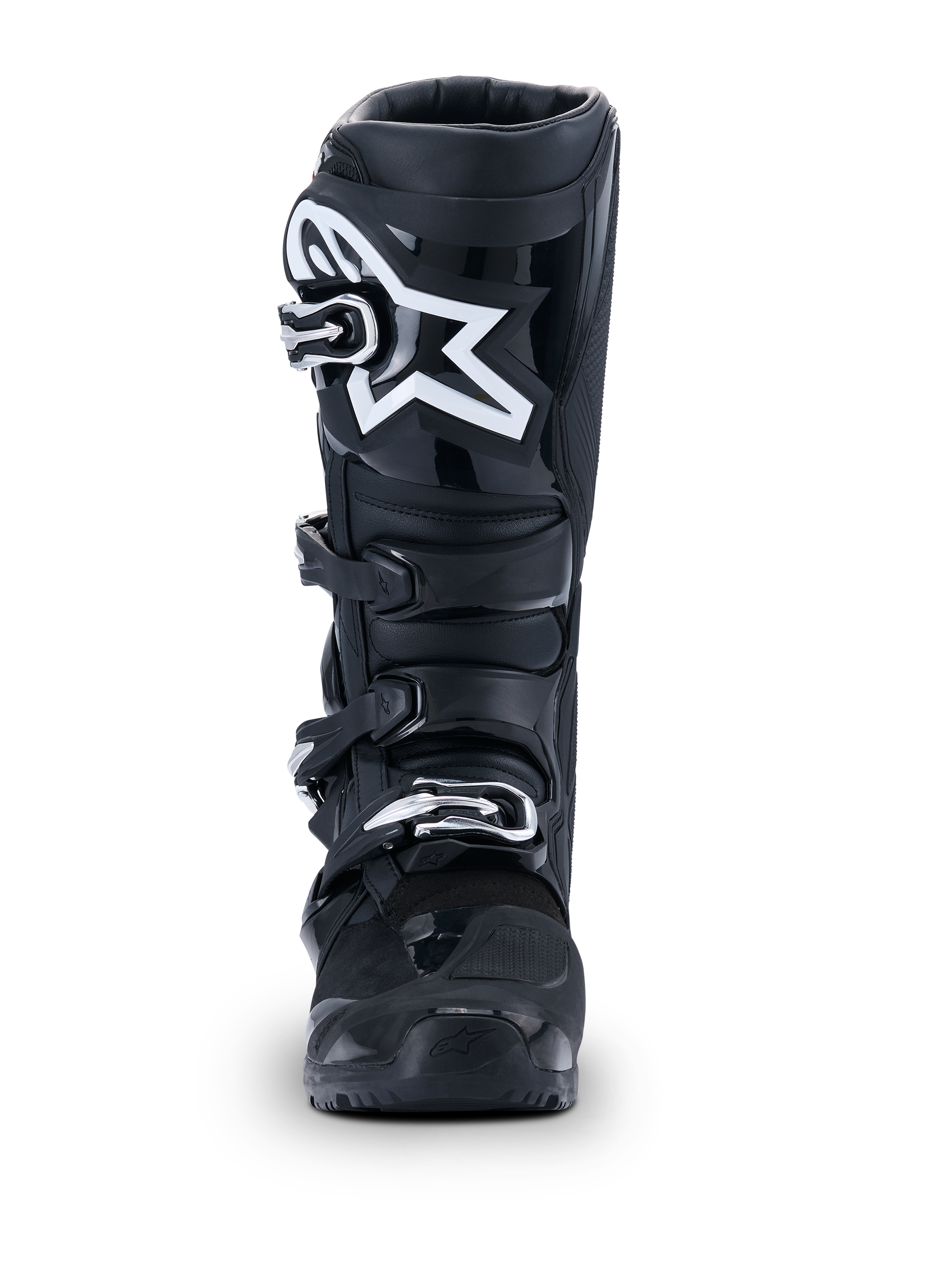 Alpinestars 2026 Tech 7 Enduro Drystar®-støvler, sorte motocross-støvler, set forfra, med et holdbart lukkesystem med fire spænder og et fremtrædende hvidt stjernelogo på skinnebensområdet, designet til off-road og enduro-performance