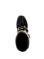 Alpinestars 2026 Tech 7 Enduro Drystar® støvler, sort, mørkegrå og guld, set oppefra ned i støvleåbningen, med guldspænde, indvendig foring og beskyttende TPU-tåboks.