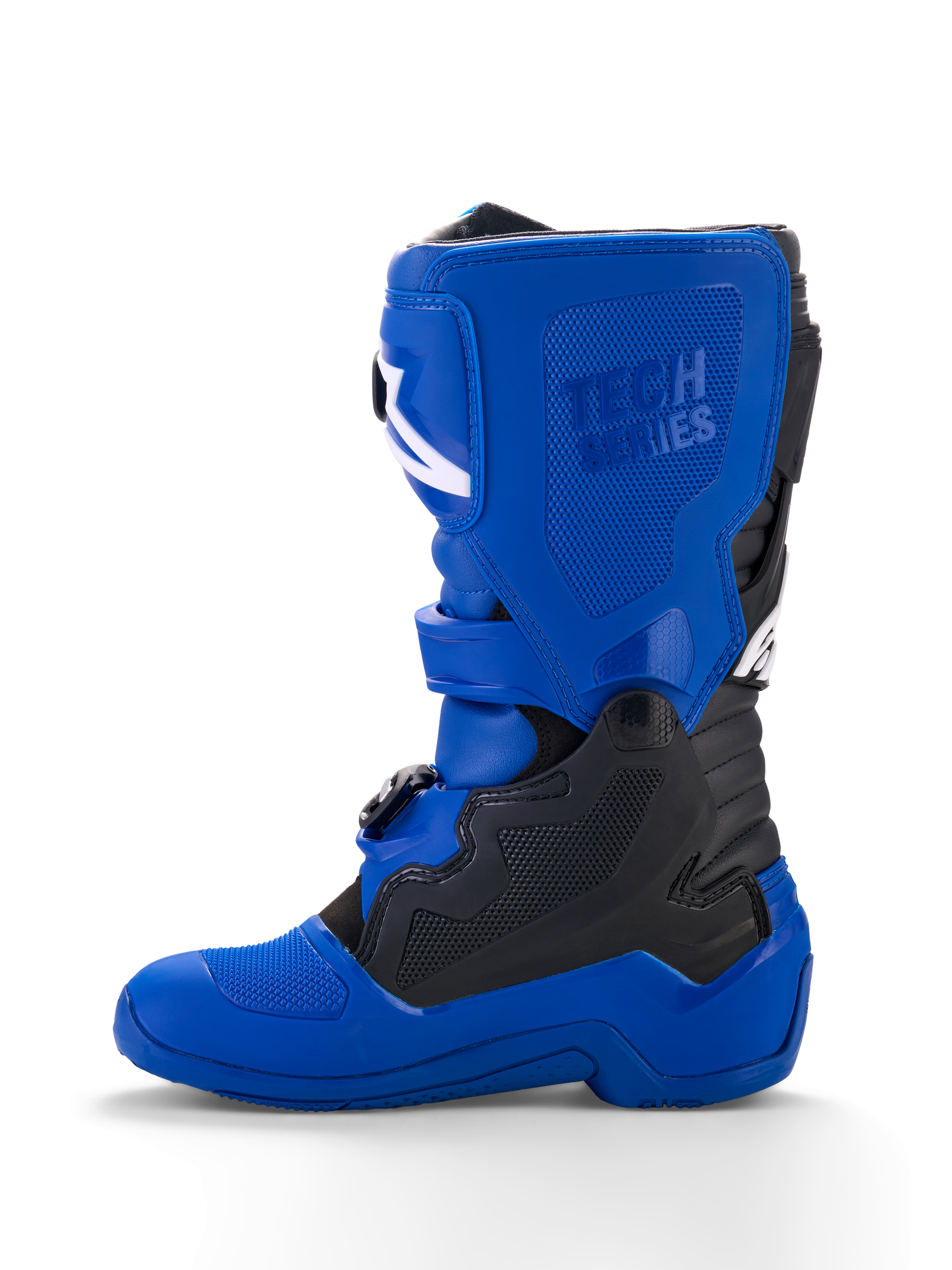 Alpinestars Yamaha Youth Tech 7S støvler, motocross-støvler til unge, blå med sorte og hvide accenter, set fra siden, med præget 'Tech Series'-branding, TPU-beskyttelsespaneler, spændelukkesystem og en slidstærk blå sål til off-road performance