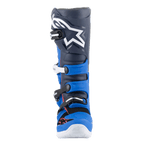 Alpinestars Tech 7 støvler, motocross-støvler, Alpine Blue, Night Navy og Bright Red, set forfra med en mørkeblå overdel, stort hvidt Astars-logo, lyseblå TPU-beskyttelsespaneler og et spændelukkesystem, højtydende fodtøj til terrænkørsel.