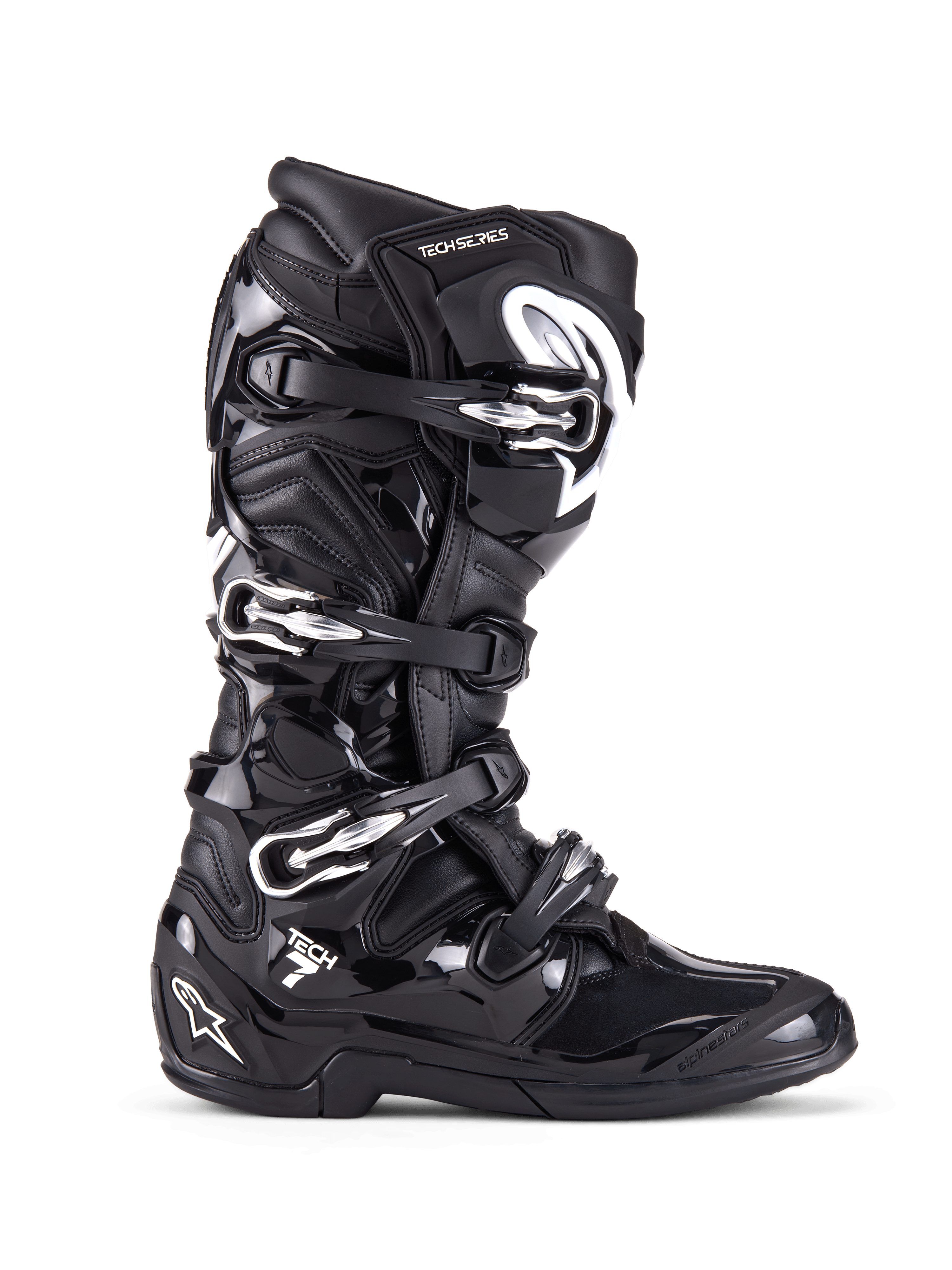 Alpinestars Tech 7 støvler, motocross off-road støvler, sort med sølvspænder og hvide detaljer, sideprofil med fire hurtigudløsnings-aluminiumsspænder, holdbar TPU-skal og teksturerede paneler til off-road beskyttelse