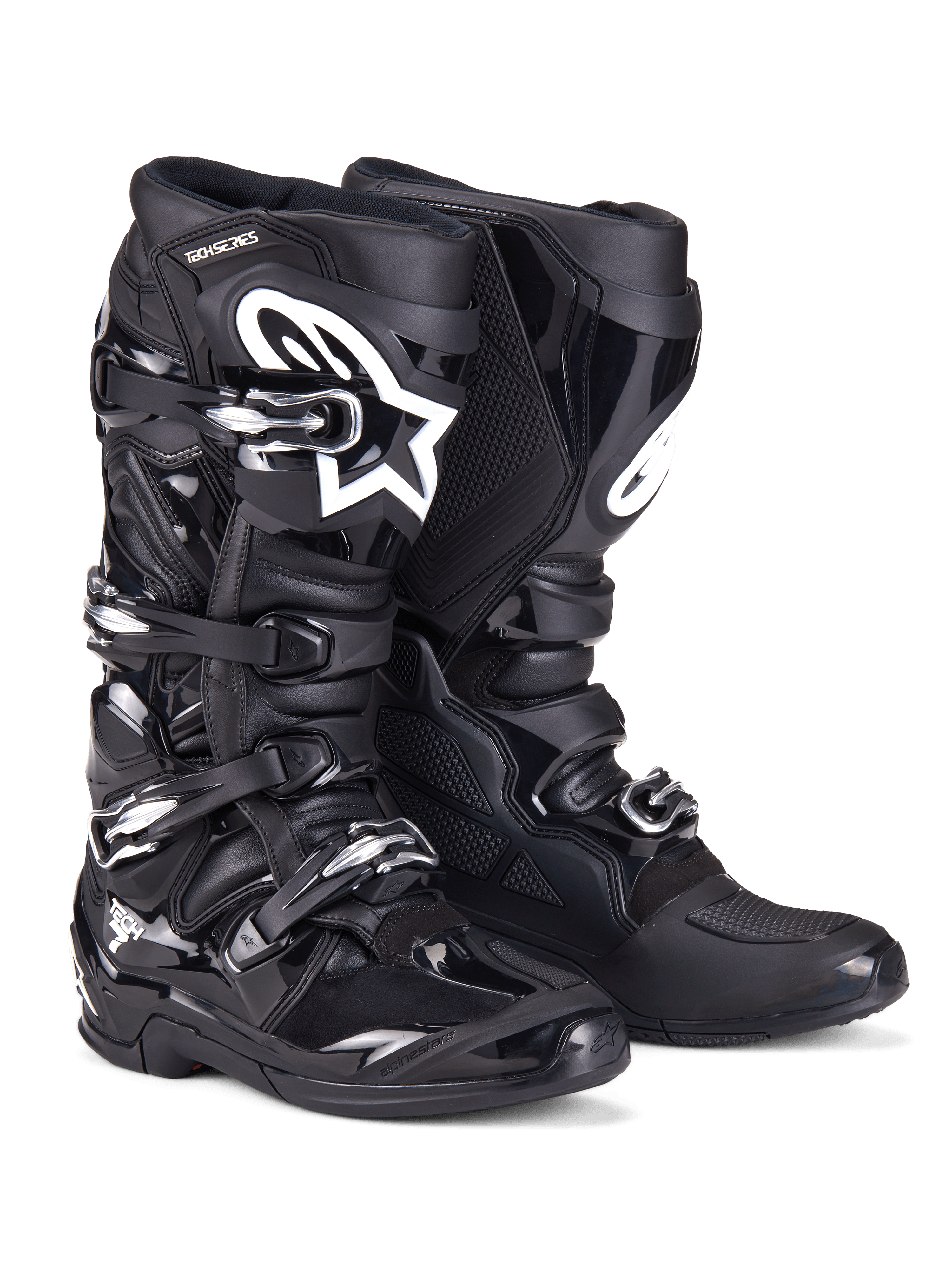 Alpinestars Tech 7 støvler, motocross-støvler, sort, robust konstruktion med fire-spænde lukkesystem, TPU-beskyttelsespaneler, hvidt Alpinestars-logo på skinnebensområdet, professionelt off-road fodtøj til terrænkørsel
