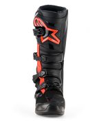 Alpinestars Tech 7 Boots, Motocross Boots, Black and Red Fluo, front view, featuring a large red fluo Alpinestars star logo on the shin plate, four-buckle closure system, and durable TPU construction designed for off-road racing.