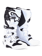 Alpinestars Tech 7 Boots, Motocross Boots, White and Black, featuring a four-buckle closure system with silver and black hardware, prominent Alpinestars logo on the shin, and reinforced TPU panels for off-road protection.
