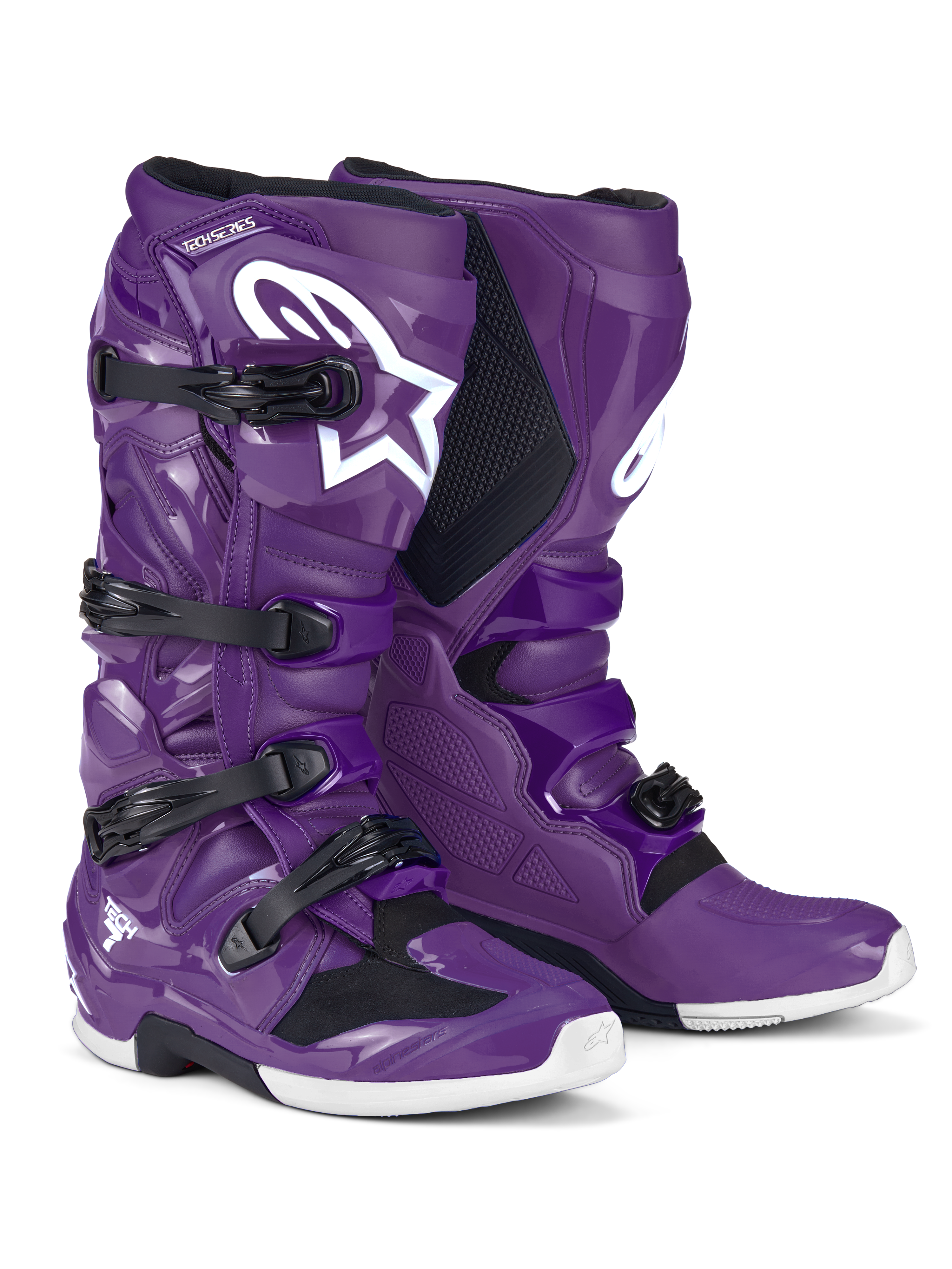 Alpinestars Tech 7 støvler, motocross-støvler, lilla, med sorte spænder og et stort hvidt Astars-logo, højtydende beskyttende design med fire stropper og holdbar TPU-skal til off-road terrænkørsel