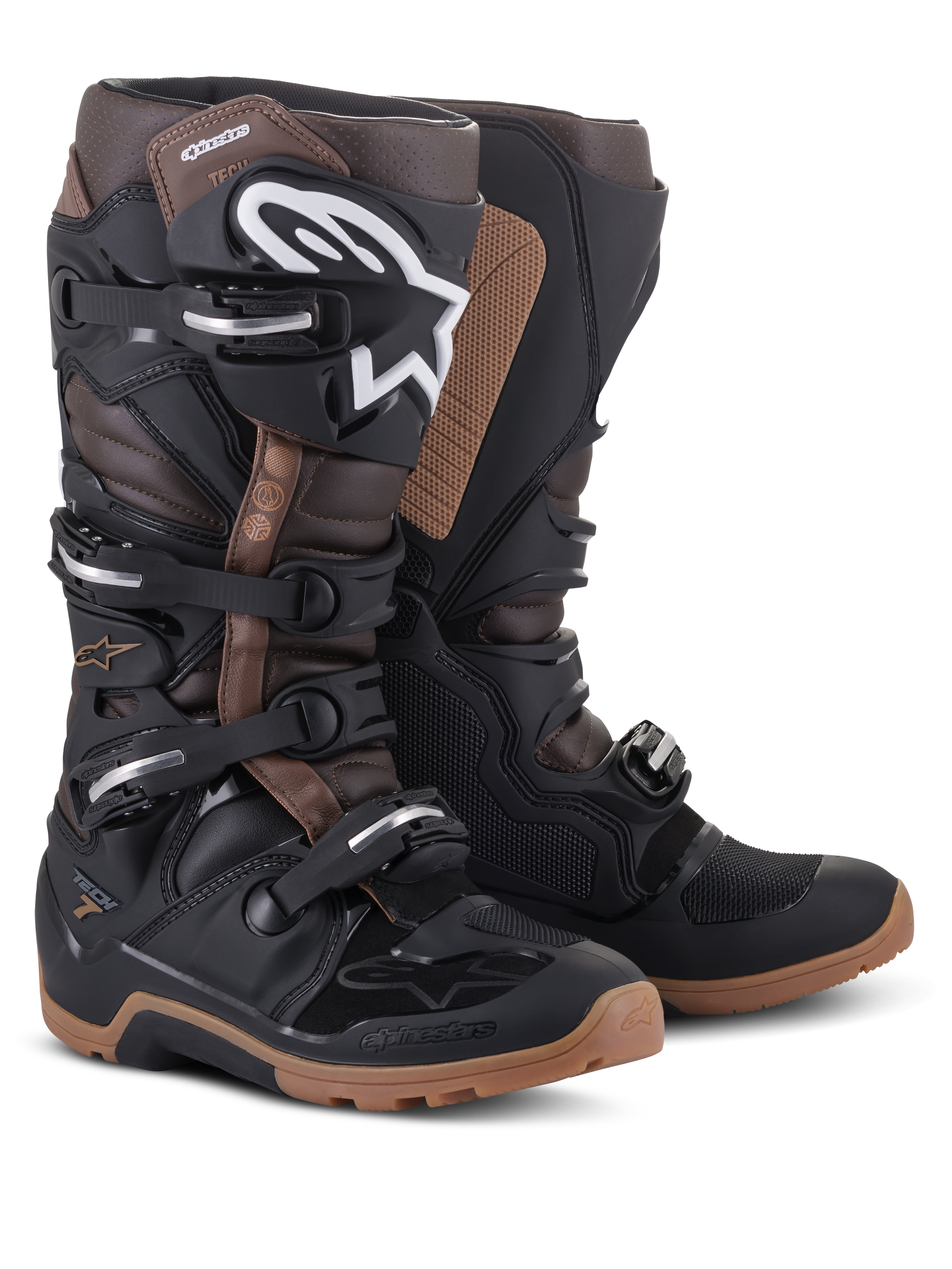 Alpinestars Tech 7 Enduro Boots, Black and Dark Brown, off-road motorcycle boots featuring a white Alpinestars logo on the shin, a four-buckle closure system, and rugged tan soles.