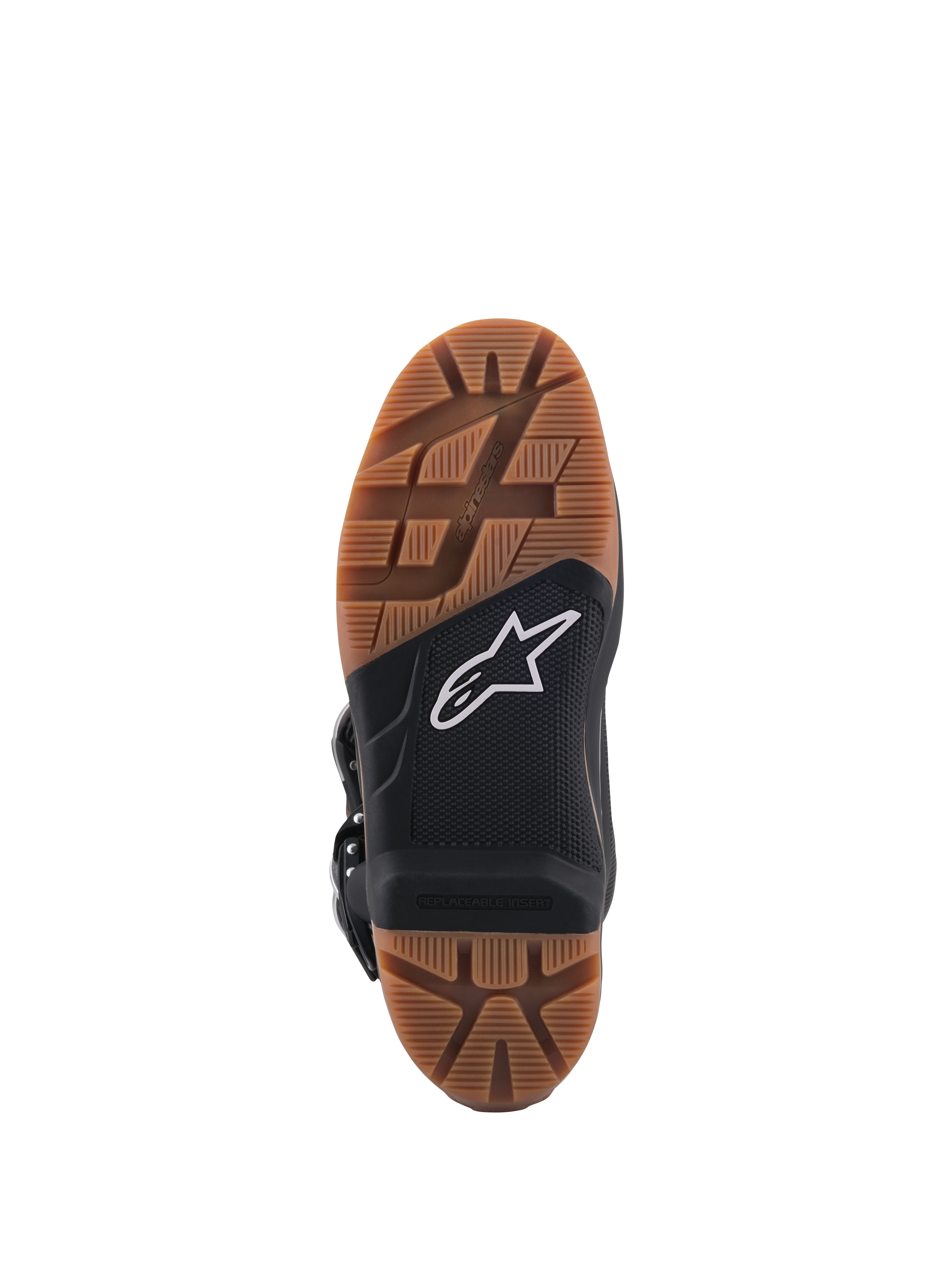 Alpinestars Tech 7 Enduro Boots, close-up view of the sole, featuring a brown rubber tread pattern and a black central section with a white star logo, highlighted replaceable footpeg insert for superior off-road grip.