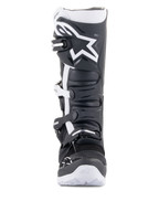 Alpinestars Tech 7 Enduro Drystar® Boots, Enduro motorcycle boots, Black and White, featuring a large white Alpinestars logo on the shin plate, four-buckle closure system, and rugged white sole, designed for off-road performance