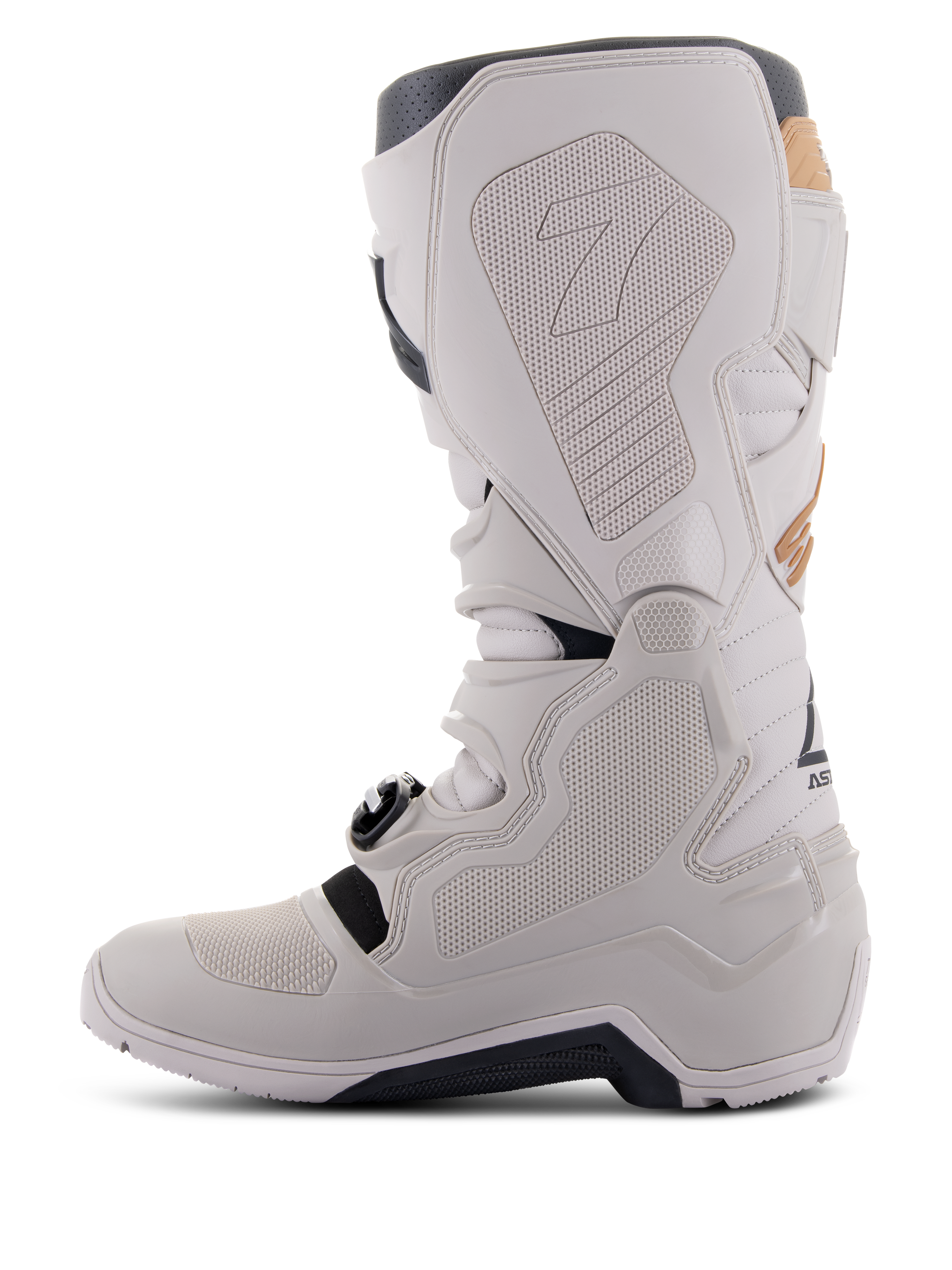 Alpinestars Tech 7 Enduro Drystar® Boots in Gray Sand, medial side view showing honeycomb-textured grip panels, light gray TPU and microfiber construction, black outsole, and waterproof membrane for off-road performance