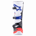 Alpinestars Tech 3 Boots, Motocross Boots, White Bright Red and Dark Blue, front view showing the protective TPU shin plate with blue logo, triple buckle closure system, and reinforced red toe section