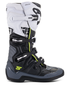 Alpinestars Tech 5 Boots, Motocross Racing Boots, White Black and Dark Gray with Fluorescent Yellow accents, featuring a four-buckle closure system, reinforced protection panels, and biomechanical pivot, premium microfiber construction for off-road performance
