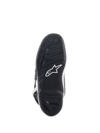 Alpinestars Youth Tech 7S Boots, Bottom Sole View, Black rubber with textured grip pattern and white Alpinestars logo, durable compound construction for youth motocross.