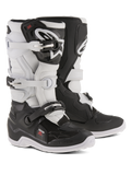 Alpinestars Youth Tech 7S støvler, motocross-støvler, sort og hvid, med justerbart spændelukningssystem, TPU-skinnebensbeskytter og pivotsystem, slidstærk konstruktion med tykke mønstrede såler til off-road kørsel