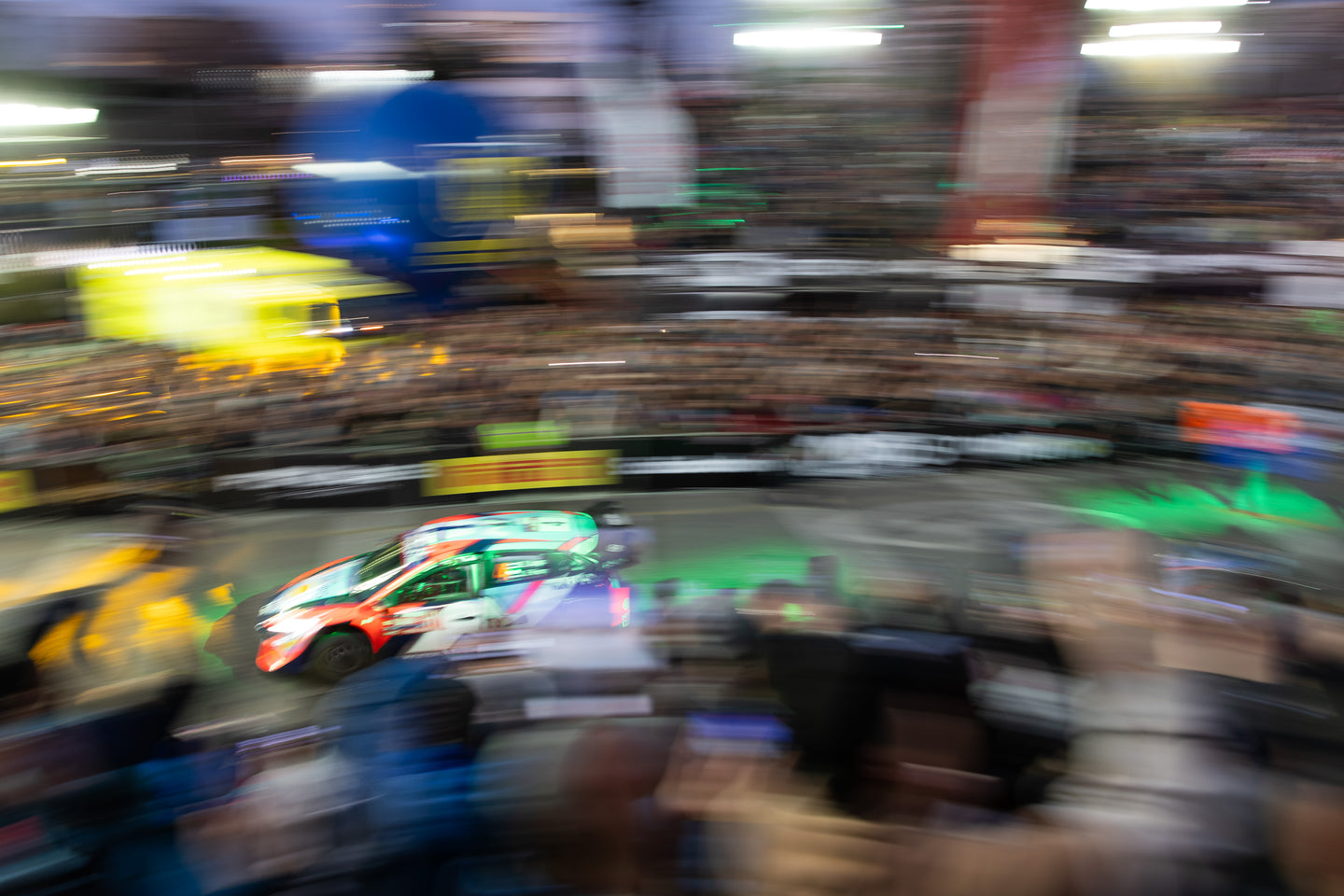 Blurry image of Esapekka Lappi racing in his Hyundai i20 rally car