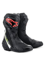 Alpinestars Supertech R Boots, performance motorcycle racing boots, black with red Alpinestars logo on the shin, white and fluorescent yellow accents, featuring technical microfiber construction and protective TPU shin plates.