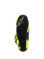 Alpinestars Supertech R-støvler, motorcykel-racerstøvler, gul fluo sort, set fra bunden, viser sort tekstureret sål med hvidt Alpinestars-logo og klare gule sidepaneler