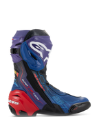 Alpinestars Supertech R LE Martinator R01 Vented Boots, high-performance racing motorcycle boots, vibrant blue purple and red colorway, featuring a perforated microfiber chassis, prominent white Alpinestars logo on the shin plate, and a reinforced red heel protector