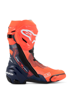 Alpinestars Supertech R Vented MM93 Replica Boots, Motorcycle Racing Boots, Red Fluo and Dark Blue with Black accents, featuring a perforated microfiber upper for ventilation, white Alpinestars logo on the shin, and number 93 branding on the toe.