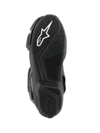 Alpinestars SMX-6 V3 Boots, bottom sole view, black rubber compound with textured grip pattern, featuring white Alpinestars logo on the forefoot and embossed branding on the heel, performance motorcycle footwear