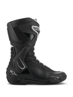Alpinestars SMX-6 V3-støvler, højtydende motorcykelstøvler, sort med hvide detaljer, sideprofil med TPU-ankelbeskyttelsessystem, teksturerede mesh-flekszoner og forstærkede hæl- og tåkomponenter til bane- og gadebrug.