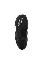 Alpinestars SMX-6 V3 Drystar® Boots, bottom sole view, black textured rubber for grip, featuring a white star logo and embossed Alpinestars branding, performance motorcycle footwear.