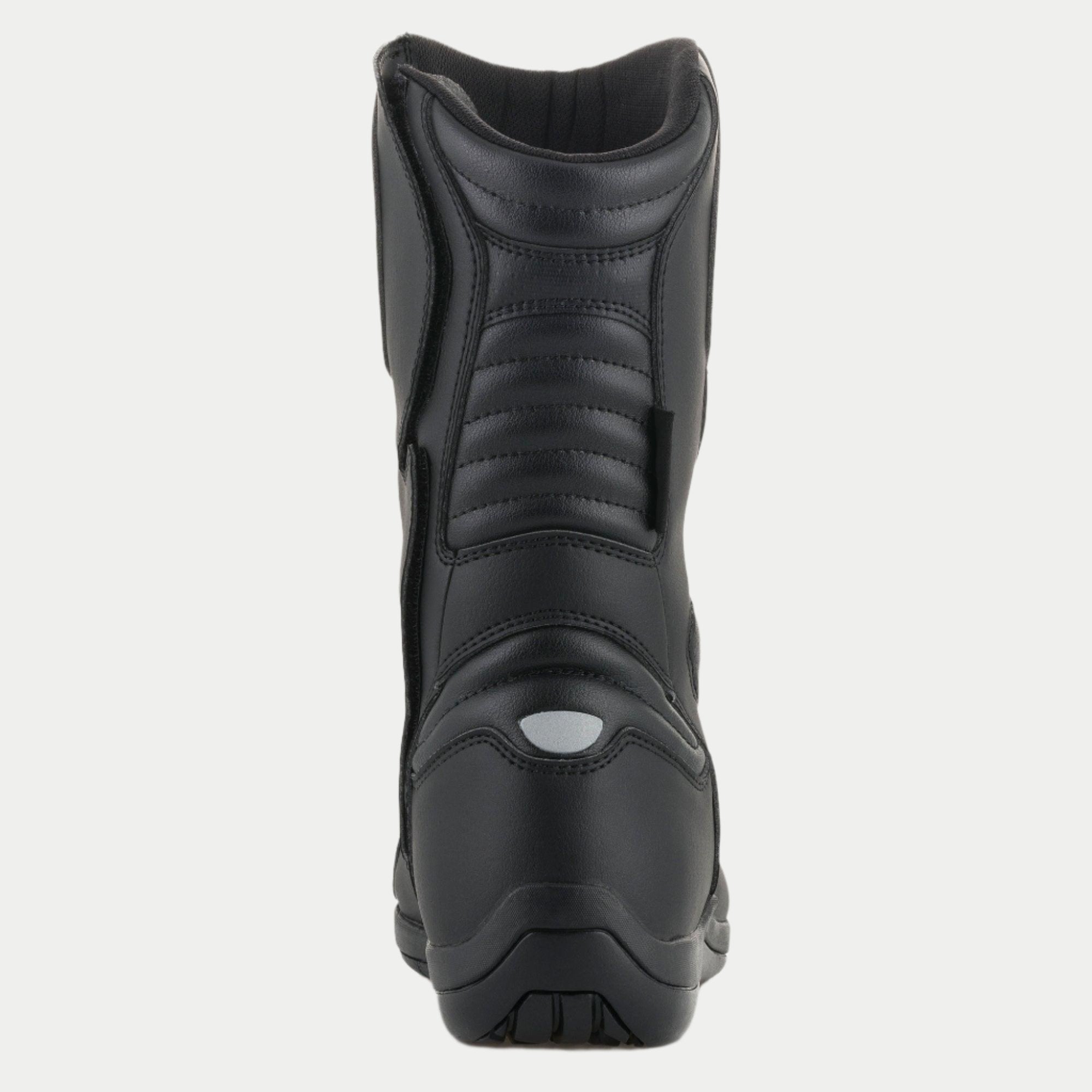 Alpinestars Origin Drystar® støvler, motorcykel touringstøvler, sort, set bagfra med harmonika-flekszoner på akillessenen og læggen, reflekterende hældetalje og holdbar mikrofiberkonstruktion
