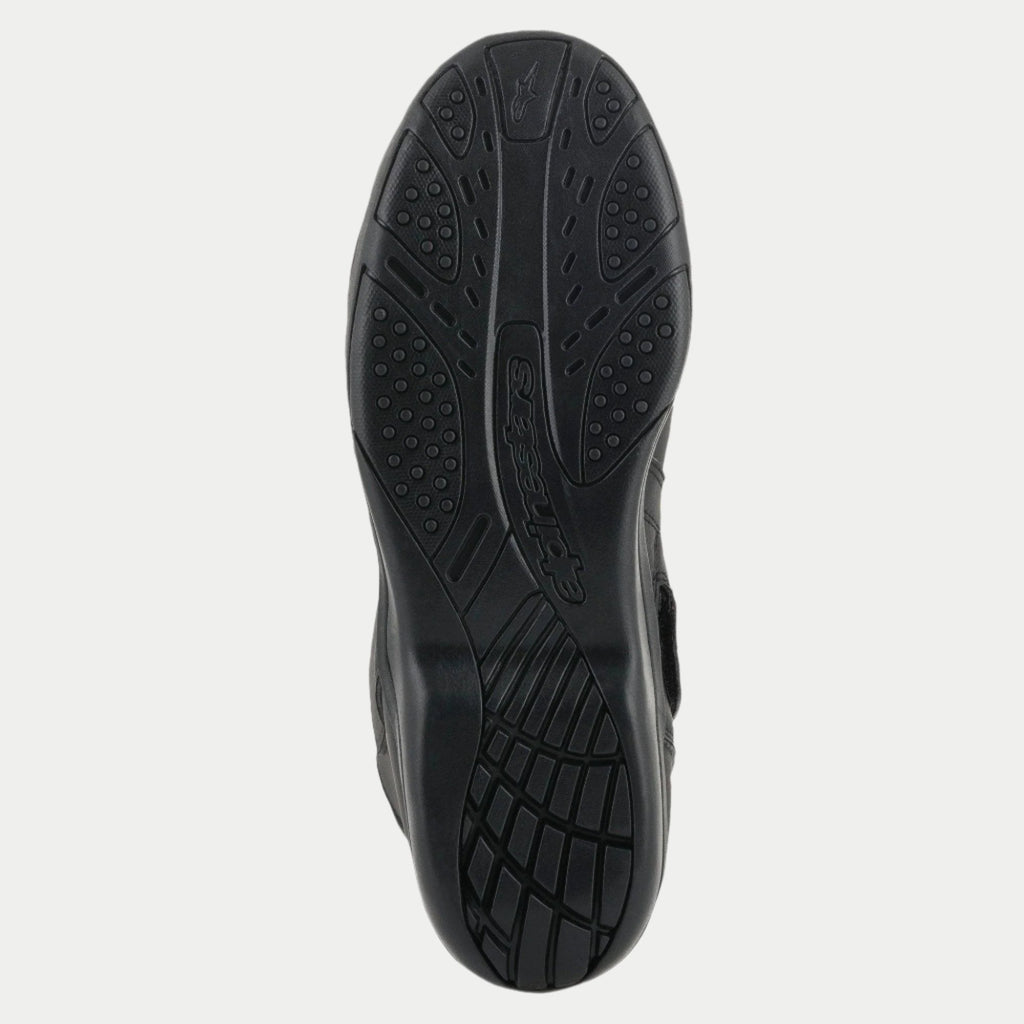 Alpinestars Origin Drystar® støvler, sort, detaljeret visning af gummiydersålen, tekstureret mønster for greb med præget logo, slidstærk sål til motorcykel touring
