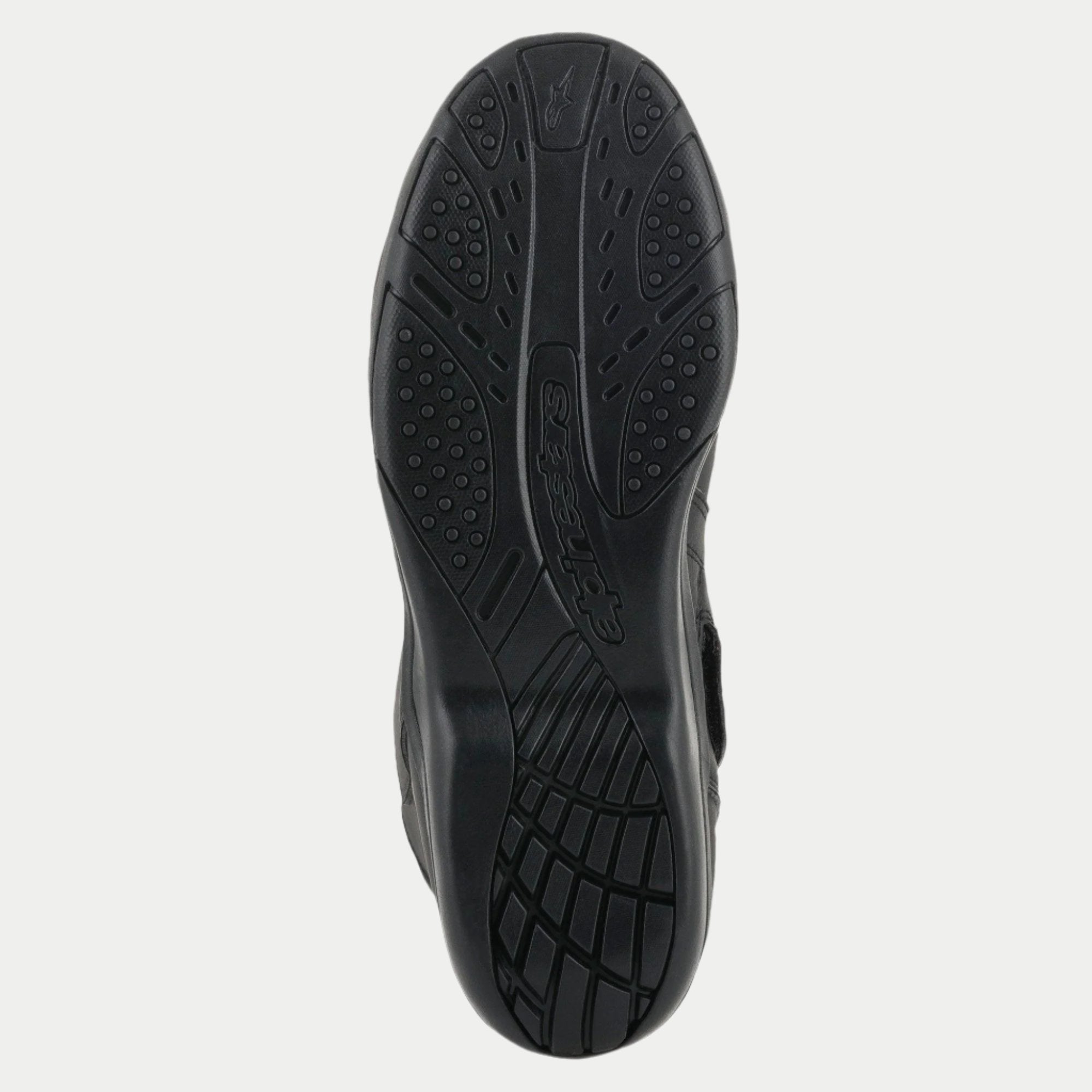 Alpinestars Origin Drystar® støvler, sort, detaljeret visning af gummiydersålen, tekstureret mønster for greb med præget logo, slidstærk sål til motorcykel touring
