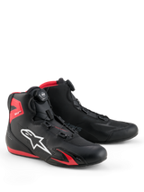 Alpinestars Celer Shoes, Motorcycle Riding Shoes, Black and Bright Red, featuring white Astars logo, micrometric dial closure system, and technical microfiber construction with red TPU accents, streamlined sporty design for racing and street riding