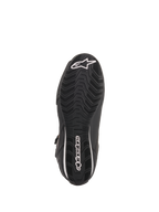 Alpinestars Stella Faster-3 Rideknit® sko til damer, sort, gul og pink, visning af ydersålen med sort gummisål med bølgeformet mønster, hvidt Alpinestars-logo og navnetræk, slidstærkt design til motorcykelkørsel på vej