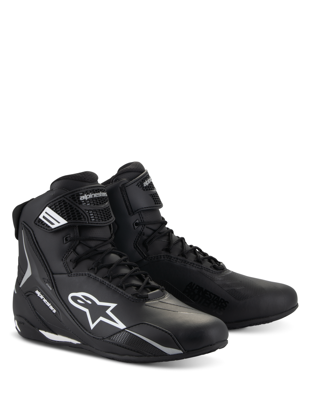 Alpinestars Stella Faster-4 sko, motorcykelsko til damer, sort med hvide detaljer, high-top sporty design med snørelukning og velcro-ankelrem, holdbar mikrofiberkonstruktion med beskyttende sidelogoer