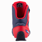 Alpinestars Austin Riding Shoe, mørkeblå og rød, set bagfra med forstærket TPU-hælkappe, rødt mesh-for og tekstureret gummiydersål, sporty motorcykelfodtøj
