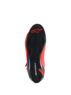 Alpinestars MM93 Faster-4 Shoes, Motorcycle Riding Shoes, Red Fluo and Dark Blue, bottom view showing the black textured rubber sole with a red Alpinestars logo at the toe and integrated grip patterns.