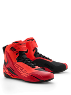 Alpinestars MM93 Faster-4 Shoes, Motorcycle Riding Shoes, Red Fluo, Bright Red, and Black, front-right perspective, featuring Marc Marquez 93 branding, traditional lace closure with hook-and-loop strap, sporty design with protective TPU accents and lightweight microfiber construction.