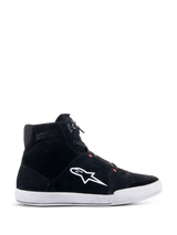 Alpinestars Chrome Shoes, Urban Riding Shoes, Black and White with Red Fluo accents, side profile featuring split suede construction, large white A-star logo, white rubber cup sole, and casual sneaker-inspired silhouette for motorcycle commuting