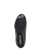 Alpinestars Stella Faster-3 Drystar® sko til kvinder, set fra bunden, sort gummiydersål med tekstureret grebsmønster, hvidt Alpinestars stjernelogo og navnetræk, holdbar motorcykelfodtøjskonstruktion