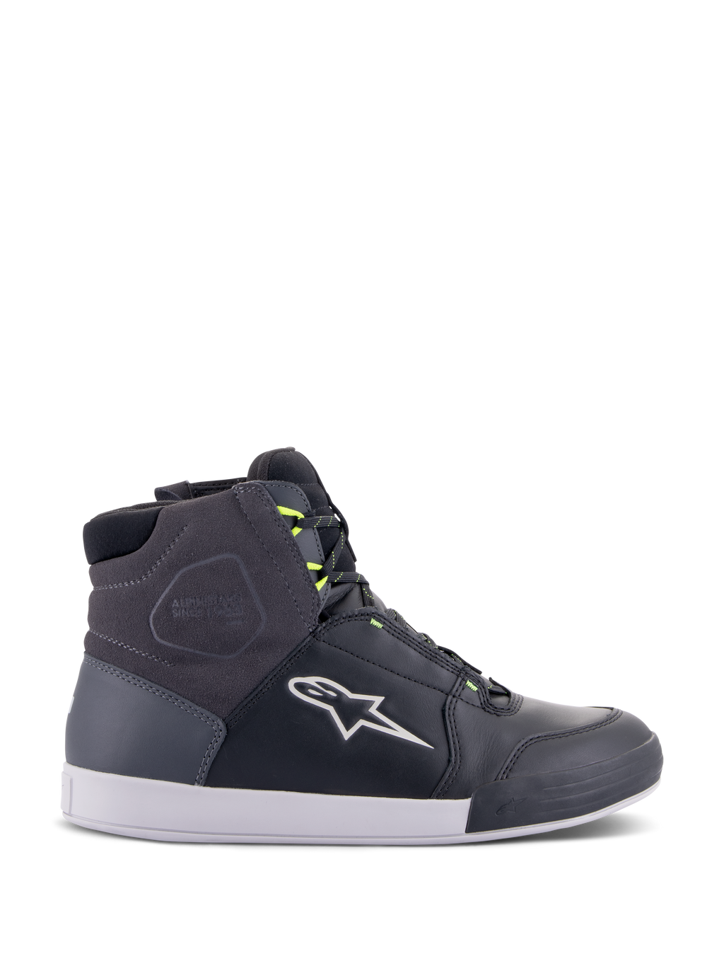 Alpinestars Chrome Drystar sko, urbane motorcykel-sneakers i sort, mørkegrå og neon gul, med paneler i førsteklasses læder og ruskind, hvid sål, neongule snørebånd og det karakteristiske stjernelogo