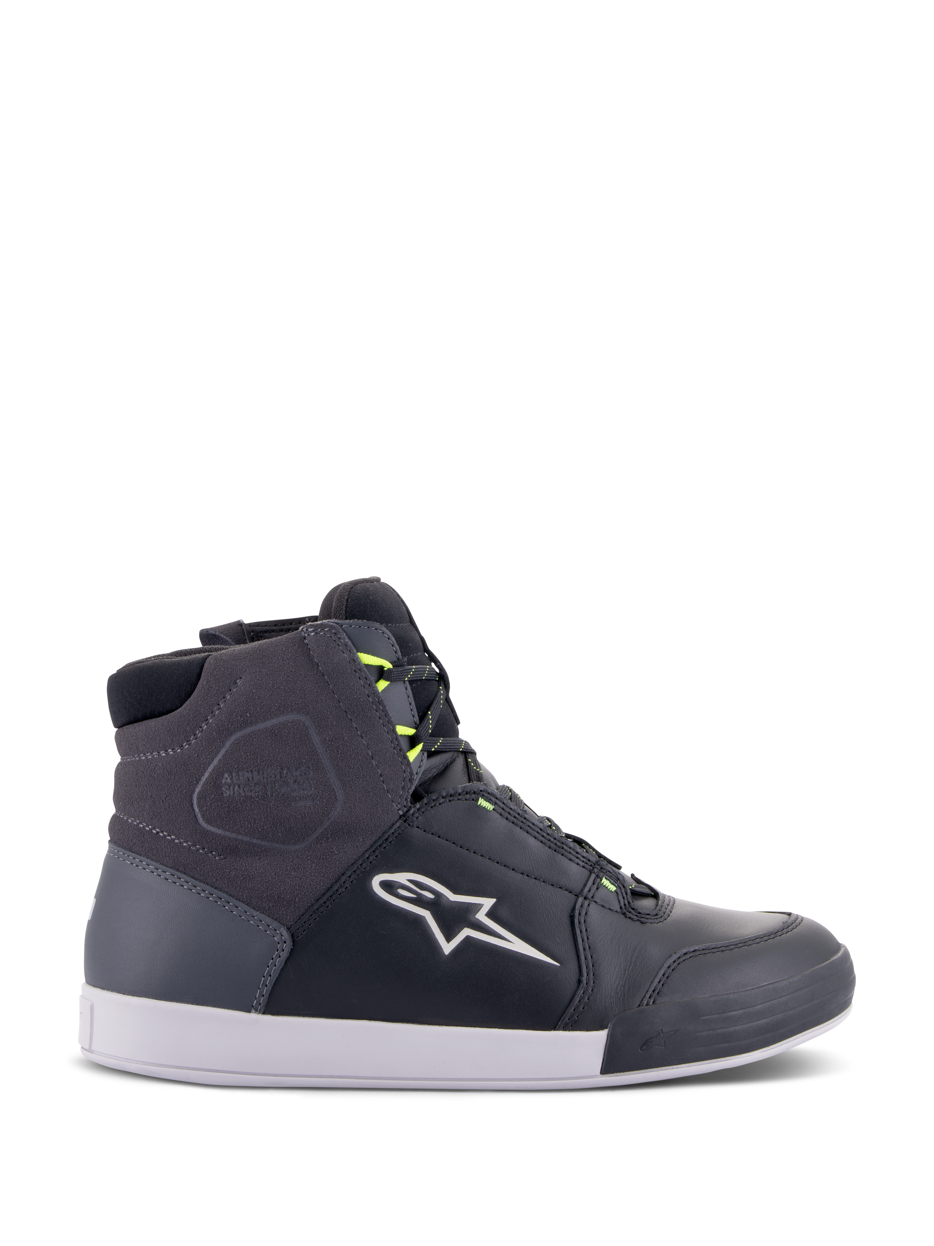 Alpinestars Chrome Drystar sko, urbane motorcykel-sneakers i sort, mørkegrå og neon gul, med paneler i førsteklasses læder og ruskind, hvid sål, neongule snørebånd og det karakteristiske stjernelogo