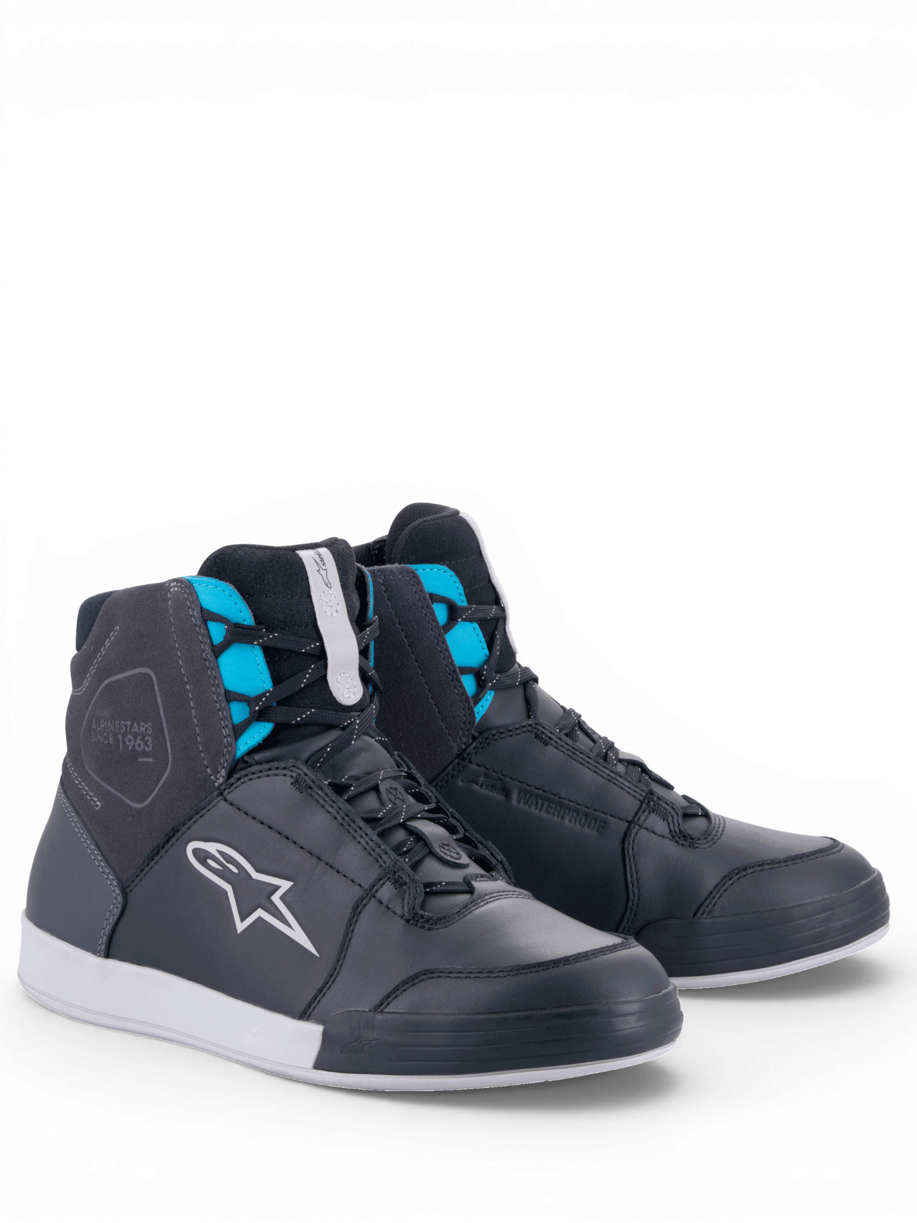Alpinestars Chrome Drystar® sko, dame-motorcykelkøresko i sort, asfaltgrå og turkis læder, vandtæt membran til urban kørsel, hvid sål og Astars-logo.