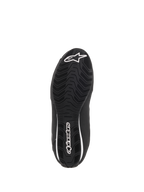 Alpinestars Women Stella Sektor Waterproof Shoes, bottom view of the black rubber sole, featuring a textured wavy grip pattern for traction, white Alpinestars star logo and wordmark, designed for water run-off and grip.