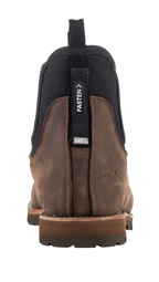 Alpinestars Turnstone Shoes, Chocolate Brown bovine leather, Chelsea boot style, rear view showing adjustable 'FASTEN' tab for internal lace system, black elastic side panels, embossed star logo on the heel, rugged lugged sole