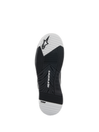 Alpinestars Speedflight sko, sort og hvid, ydersålsvisning der viser gummisålen med dobbelt densitet, har Alpinestars-logo og TPF-branding, asymmetrisk slidbanemønster for greb og stabilitet ved motorcykelkørsel
