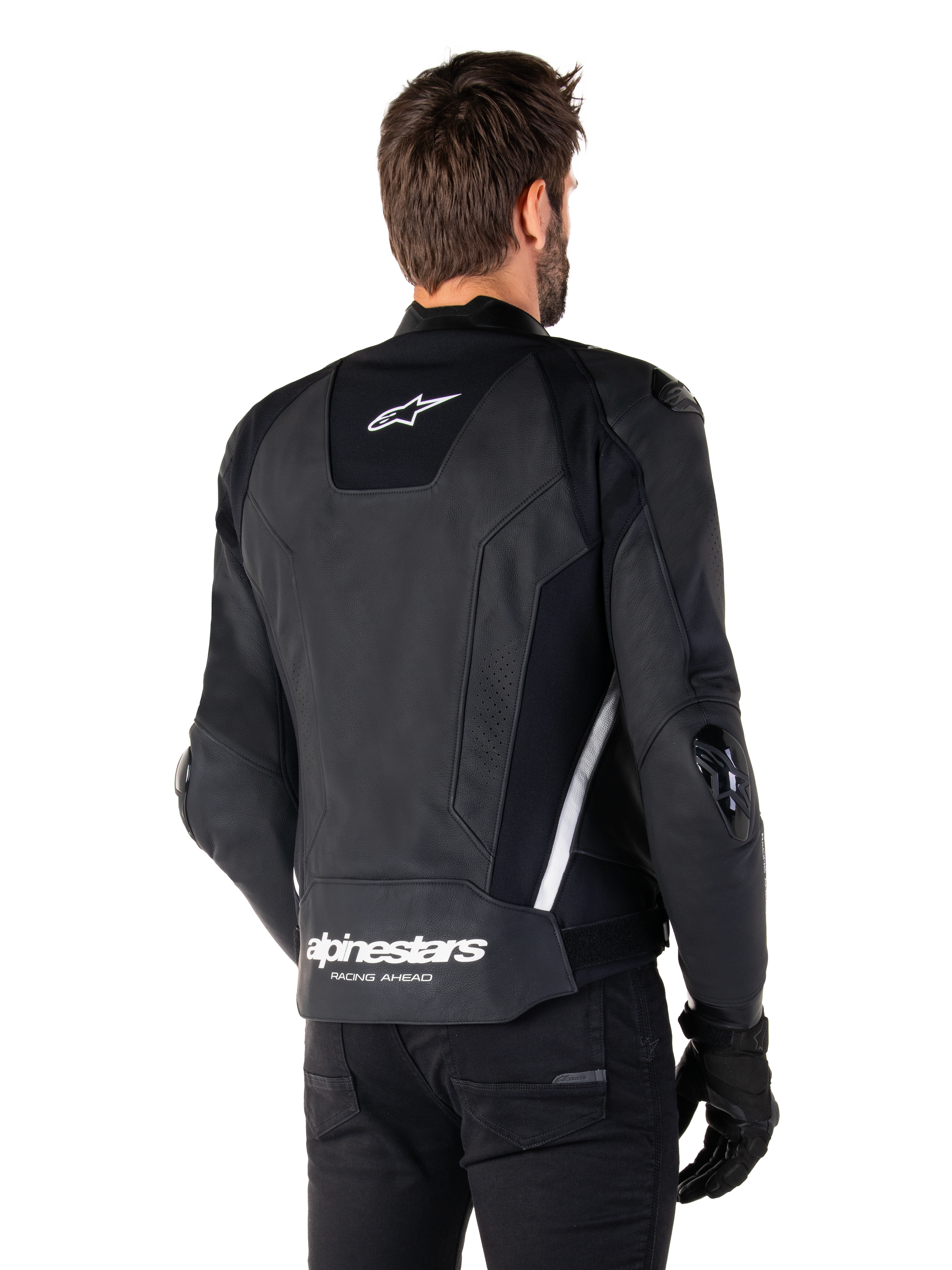 Alpinestars Missile V3 læderjakke, set bagfra, sort og hvid, med Alpinestars-stjernelogo på den øverste ryg og navnetræk på den nederste ryg, beskyttende glidere på albuer og skuldre, premium læder-racerudstyr