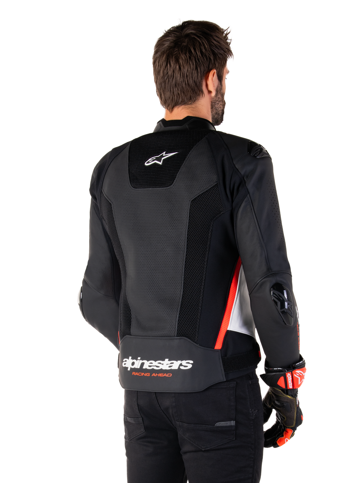 Alpinestars Missile V3 Airflow læderjakke, set bagfra, sort, hvid og rød fluo, med omfattende perforeringer for køling, udvendige DFS-skydere på skuldre og albuer og Alpinestars-branding på lænden.