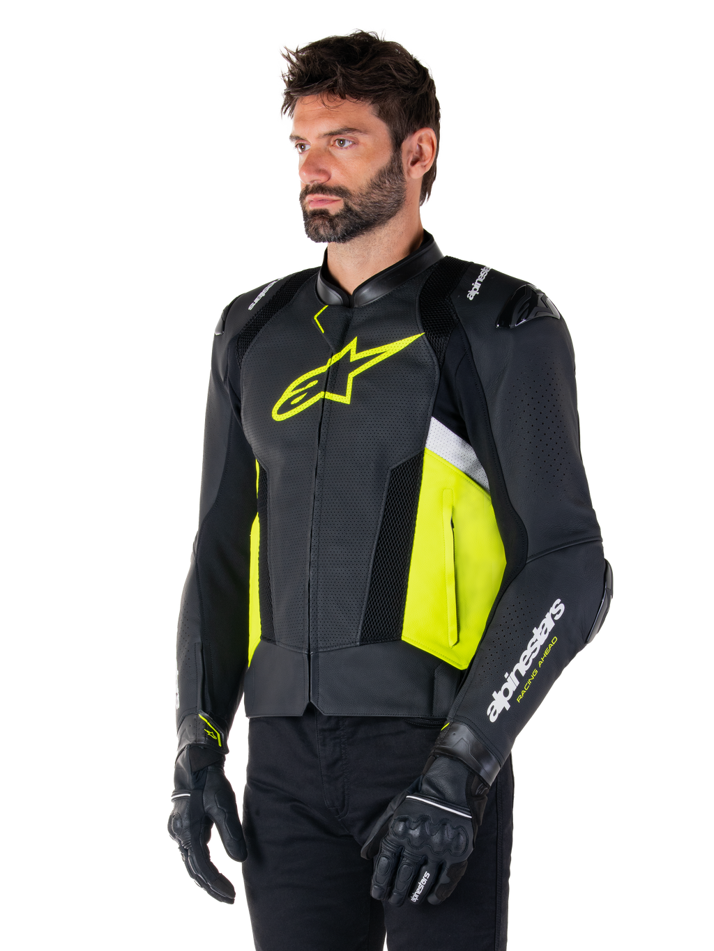 Mandlig model iført Alpinestars Missile V3 Airflow læderjakke, sort med Yellow Fluo og hvide detaljer, perforeret læder for maksimal ventilation, markant gult logo på brystet, kombineret med sorte handsker og bukser, sports- og racing-motorcykeludstyr