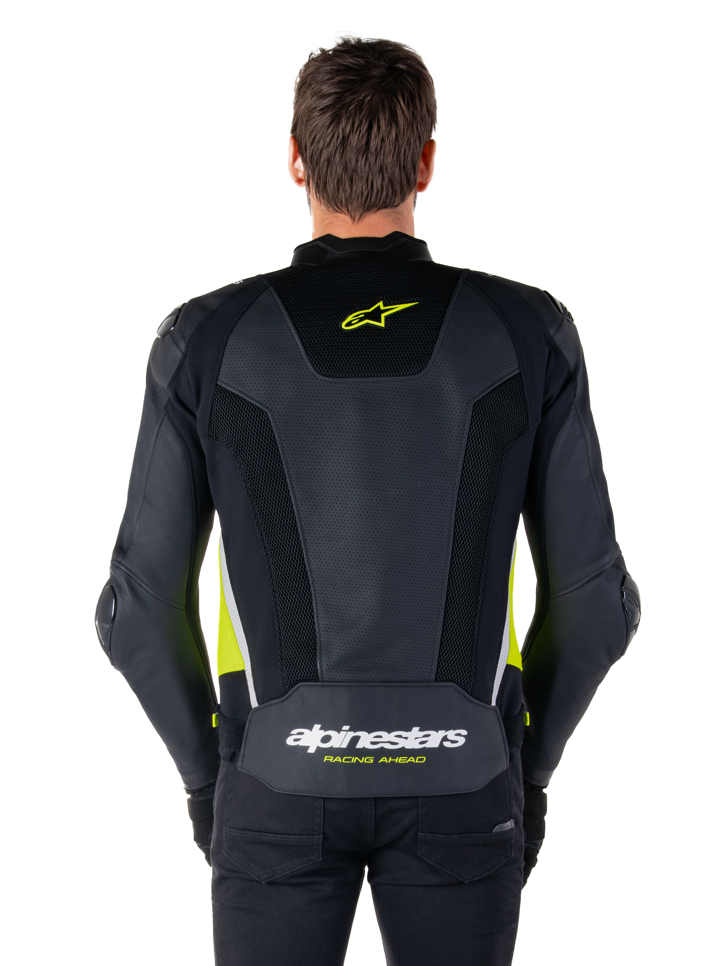 Alpinestars Missile V3 Airflow læderjakke, set bagfra, sort med fluo-gule og hvide detaljer, omfattende perforerede læderpaneler til køling, Alpinestars-branding på øvre og nedre ryg, racing-inspireret motorcykel sportsjakke