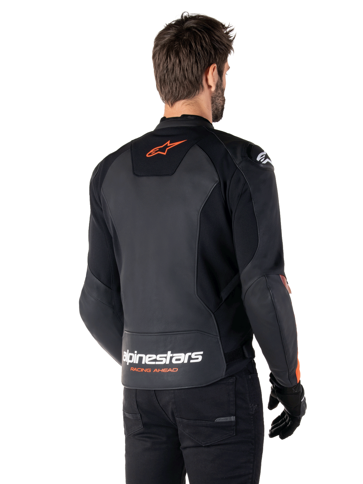 Alpinestars Faster V3 læderjakke, sportmotorcykeljakke, sort og fluorød, med premium læderkonstruktion, HRSF-strækpaneler og DFS GP Lite-skulderbeskyttere, strømlinet race-inspireret design med tekniske detaljer.