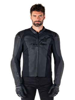 Alpinestars Faster V3 Leather Jacket, Black Motorcycle Jacket, premium leather with HRSF stretch panels, sleek sport fit, reinforced shoulders with protectors, worn with black gloves, professional gear for road riding