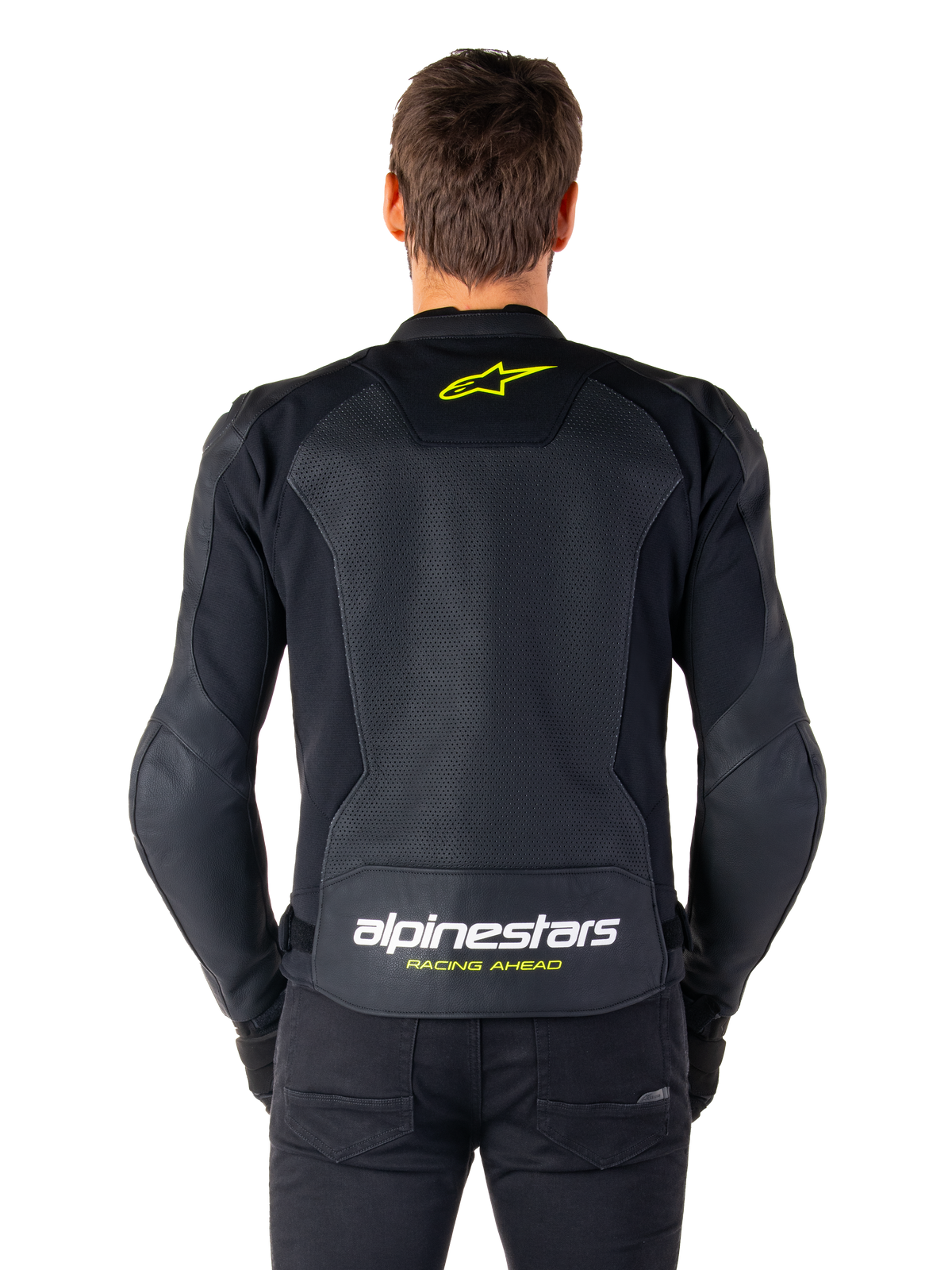 Alpinestars Faster V3 Airflow læderjakke, sport motorcykeljakke, sort med fluoriserende gule detaljer, set bagfra med store perforerede læderpaneler, gult stjernelogo øverst på ryggen og markant branding nederst.