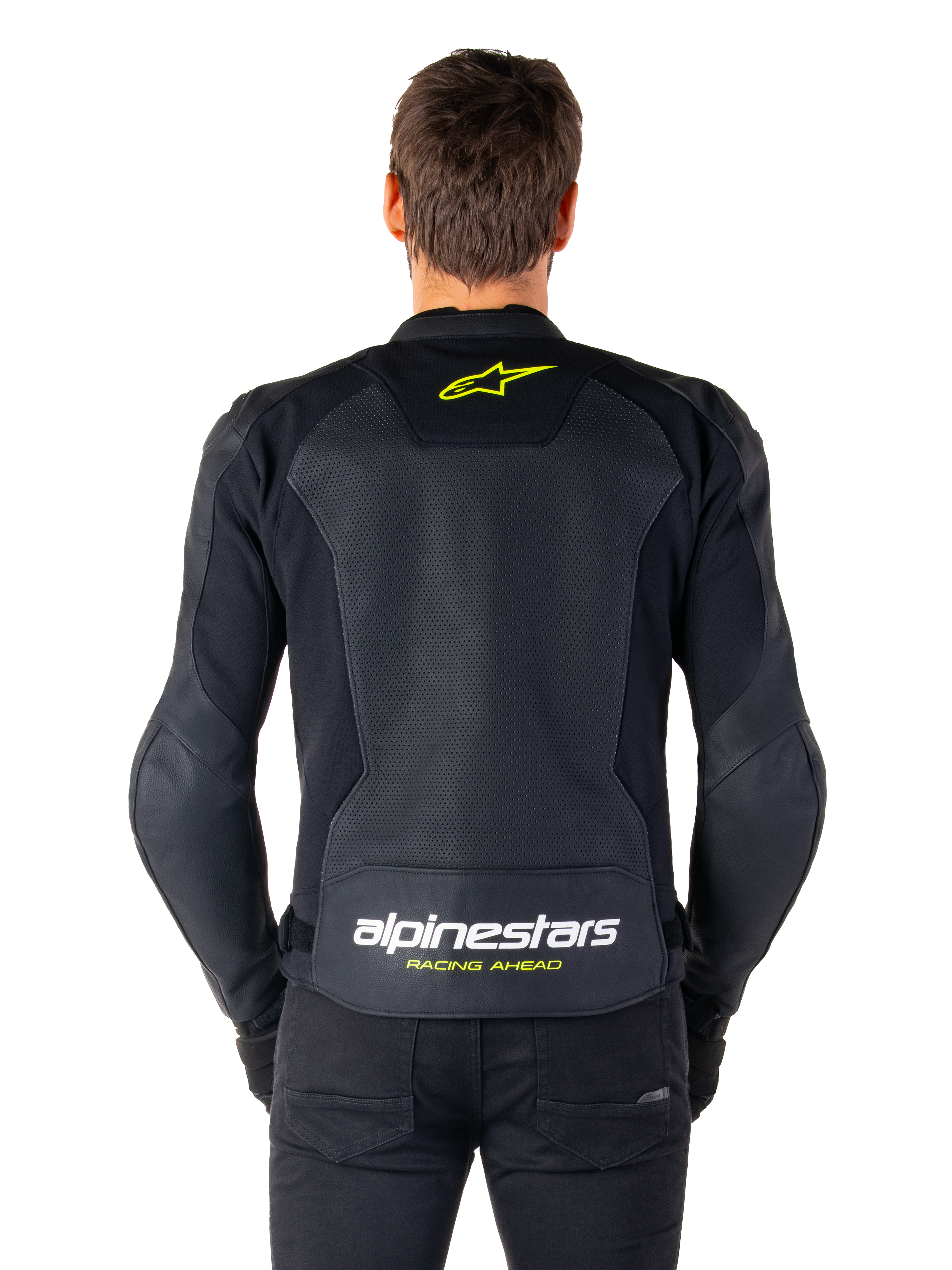Alpinestars Faster V3 Airflow læderjakke, sport motorcykeljakke, sort med fluoriserende gule detaljer, set bagfra med store perforerede læderpaneler, gult stjernelogo øverst på ryggen og markant branding nederst.